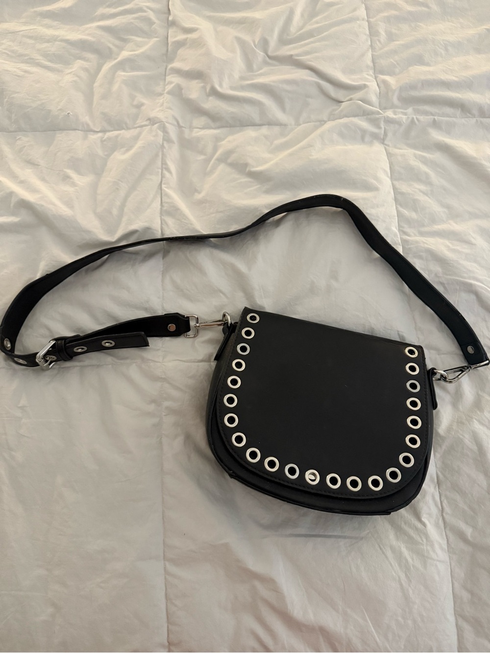 Black Grommet-Trim Crossbody Saddle Bag